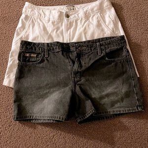 white womens Jean shorts size 2. 2nd pair is Juniors size 11 black Jean shorts.